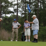 Residents golfing.